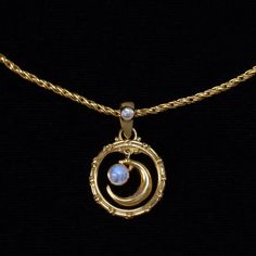 This Rainbow Moonstone gold moon necklace, handcrafted in 18K Gold Vermeil is designed in a Balinese style, adding a touch of exotic allure. The celestial necklace features a Moonstone crescent moon elegantly dangling in a Balinese-style hoop, accented by a smaller moonstone on the bail.  While the moon symbolizes feminine energy, emotions, and feelings, Rainbow Moonstones have been used in ancient rituals for their powerful healing properties. They are known to strengthen your intuition, provide protection, and attract love, making this Moonstone gold moon necklace not only a beautiful accessory but also a meaningful talisman. The Gold Vermeil moon necklace is individually packaged in my black Bluemoonstone Creations gift box with a description card, describing the spiritual and beneficia Crescent Moon Necklace Aesthetic, Moon Ritual Aesthetic, Moon Jewelry Aesthetic, Moon Necklace Aesthetic, Blue Moon Necklace, Ancient Rituals, Balinese Style, Rainbow Moonstone Jewelry, Gold Moon Necklace