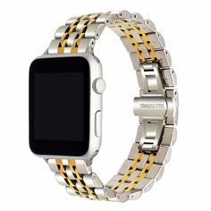 an apple watch with yellow and silver bracelets on the band, showing the time displayed