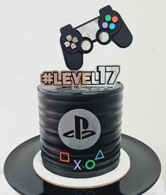 a birthday cake with a video game controller on top