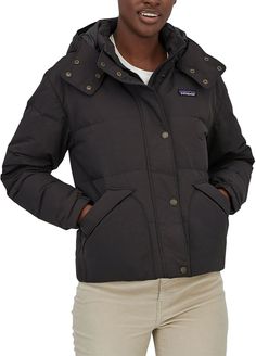 FIT & DESIGN: Regular fit, full-zip jacket Removable insulated hood with adjustment cords that allow for a cinched look that holds in warmth Insulated with recycled duck and goose down Covered metal button placket protects from the wind and weather Two double entry front pockets and one internal zippered pocket keep items secure Drawcord hem Hip length TECHNOLOGY: Durable water repellent coating Shell designed with NetPlus® 100% postconsumer recycled nylon faille Additional Details: Fair Tra Patagonia Outfit, Patagonia Women, Patagonia Jacket, Pull Sweat, Shorts With Tights, Black Queen, Jacket Design, Patagonia Womens, Jackets Online