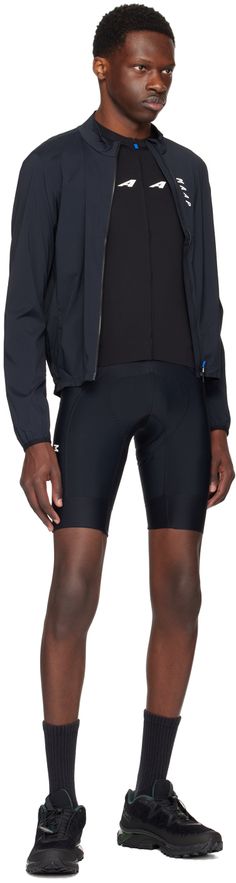 Packable and lightweight stretch nylon ripstop jacket. Perforated detailing throughout. · Wind-resistant · Paneled construction · Stand collar · Two-way zip closure · Reflective logo bonded at chest, sleeve, and back · Partially elasticized hem · Elasticized cuffs · Packs into zip pocket at back hem · Non-slip silicone band at inner hem · Unlined Supplier color: Black Team Jackets, Silicon Bands, Stand Collar, Zip Pockets, Band, Collar, Black, Color