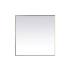 a square mirror on a white wall with a gold border around the edges and bottom edge