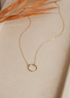 We love jewelry we can live in. Like this Full Circle Necklace. Wear it alone or layered with your favorite delicate choker. Circle measures just over 1/2" wide. Available in Sterling Silver or 14kt Gold Fill. Handmade in Eau Claire, WI All of our jewelry is handmade to order just for you so each piece will be unique and may vary slightly from what is pictured. Due to its handmade nature, please allow 3-5 business days for orders to ship. Delicate Choker, Everyday Wear Jewelry, Love Jewelry, Circle Necklace, Full Circle, 14kt Gold, Earring Necklace, Beautiful Necklaces, Anklets