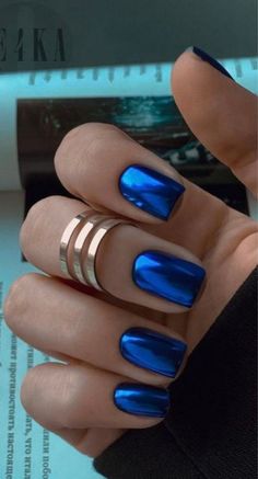 45 Stunning & Trendy Winter Nail Colors to Try This Season Royal Blue Nails Winter, Xmas Blue Nails, Winter Christmas Nails Blue, Winter Blue Nail Designs, Royal Blue Chrome Nails, Winter Color Nails, Dark Blue Winter Nails, Blue Nails Winter, Shades Of Blue Nails