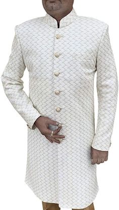 Mens Cream Traditional Indowestern Sherwani for Groom 2 Pc (Indowestern, pant) made in polyester fabric. It has golden color trouser as bottom made from dupion fabric. Cream Fitted Sherwani For Semi-formal Occasions, Semi-formal Fitted Cream Sherwani, Gold Fitted Sherwani For Groom, Fitted Gold Sherwani For Semi-formal Events, Gold Fitted Sherwani For Semi-formal Events, Gold Fitted Nehru Jacket For Groom, Traditional Gold Bandhgala For Semi-formal Occasions, Fitted Gold Nehru Jacket For Festivals, Gold Fitted Nehru Jacket For Festivals