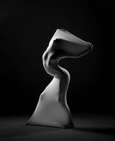 a black and white photo of a sculpture