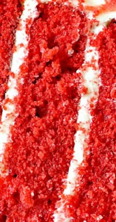 red cake with white frosting and stripes on it