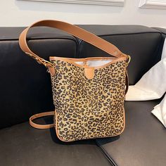 Garner Women's Leather Leopard Crossbody Handbag | Ultrasellershoes.com – Ultra Seller Shoes Trendy Large Capacity Bucket Phone Bag, Casual Large Capacity Phone Bag For School, Summer School Bucket Bag, Rectangular Shape, Summer School Bucket Bag Rectangular, Summer School Rectangular Bucket Bag, Casual Everyday Bucket Bag With Mobile Phone Bag, Casual Bucket Bag With Cell Phone Pocket, Casual Everyday Bucket Bag With Mobile Phone Pocket, Bucket Bag With Cell Phone Pocket