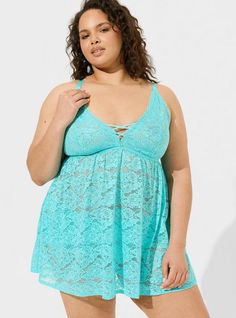 FIT Babydoll silhouette. . MATERIALS + CARE Lace knit fabric. 93% nylon, 7% spandex. Hand wash; line dry. Imported. DETAILS V-shaped neckline. . XO details on front. . Lace print. . The best plus size women's simply lace xo front babydoll chemises & babydolls in blue radiance made of lace. Sleep Gown, Disney Leggings, Shoes For Leggings, Lace Print, Lingerie Dress, Matches Fashion, Lace Knitting, V Shape, Betsey Johnson