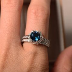 London blue topaz ring engagement ring sterling silver | Etsy Silver Sapphire Promise Ring In 14k White Gold, Classic White Gold Blue Topaz Birthstone Ring, Classic White Gold Topaz Ring, Classic White Gold Birthstone Ring With Blue Topaz, Emerald Cut Silver Topaz Ring For Wedding, Emerald Cut Silver Topaz Wedding Ring, Sterling Silver Solitaire Topaz Promise Ring, 14k White Gold Topaz Birthstone Ring, Formal Sterling Silver Stackable Rings With Accent Stones