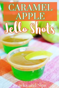 caramel apple jello shots in plastic cups on a checkered tablecloth with text overlay that reads caramel apple jello shots