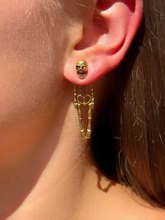 Just in time for Halloween! 🎃👻 Add a touch of mystical charm to your look with our skeleton earrings. These unique accessories will make your costume truly unforgettable. Perfect for parties and everyday wear. Order now and be the center of attention at all festive events! 🖤💀 Gold Punk Jewelry For Halloween, Punk Gold Jewelry For Halloween, Punk Style Gold Jewelry For Halloween, Edgy Skull-shaped Pierced Earrings, Edgy Halloween Jewelry, Bone Colored Metal Earrings For Pierced Ears, Gold Skull Earrings Nickel Free, Gold Skull-shaped Earrings, Edgy Pierced Skull Jewelry