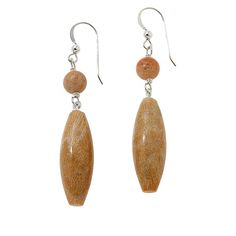 Jay King Sterling Silver Leopard Skin Chalcedony Drop Earrings The unique chalcedony stones used in these handcrafted earrings display shades of yellow and brown reminiscent of "Leopard skin." Slip them on anytime for an easy, color-neutral accent. From Jay King.       Approx. 2-5/16"L x 3/8"W     Stamped .925     Pierced with wire backs     Earrings have elongated brown and yellow "leopard skin" chalcedony bead drops     Drops topped with round, leopard skin chalcedony bead   Stone Information Brown Natural Stone Drop Earrings, Artisan Brown Earrings With Natural Stones, Earrings Display, Jewelry King, Leopard Skin, Chalcedony Stone, Color Bands, Drop Top, Earring Display