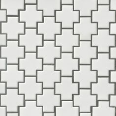 a white tile pattern that looks like it has been made out of squares and rectangles