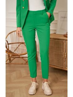 Elevate your professional attire with our green straight cut suit pants for women! These pants feature a classic straight-leg cut that creates a flattering and timeless silhouette. The versatile green color adds a pop of color to your wardrobe and pairs perfectly with any neutral top. The comfortable yet stylish design makes them perfect for any occasion. Dress them up for a formal event or wear them to the office for a chic and professional look.