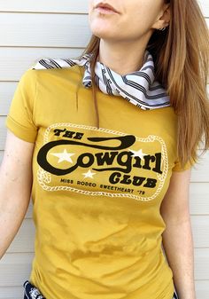 The Cowgirl Club Tee by kaeraz / womens graphic tees / vintage style 70s southwest t shirt / cowgirl arizona desert country gifts souvenir t-shirt Retro T-shirt For Western-themed Summer Events, Retro Summer T-shirt For Western-themed Events, Letter Print T-shirt For Rodeo, Retro Western Style Short Sleeve Top, Vintage Letter Print Tops For Western-themed Events, Vintage T-shirt For Western-themed Summer Events, Retro Crew Neck Tops For Western-themed Events, Retro Letter Print Tops For Rodeo, Retro Rodeo Crew Neck T-shirt