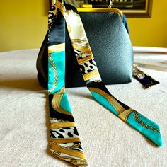 Brand New, In Original Package, High Shine Polyester Scarf With Gorgeous And Chic Pattern! With Teal And Gold Accents To Amp Up And Bag! 39.4” Long And 1.5” Width Handbag Scarf, Polyester Scarf, Chic Pattern, Teal And Gold, Gold Accents, Blue Gold, Scarf Wrap, Scarf Accessory, Women Accessories