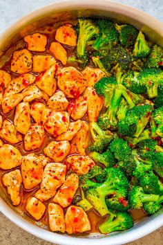 broccoli and chicken in a pot with sauce