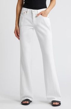 Effortlessly cool and laid-back, these slouchy, full-length bootcut jeans are made from lightweight, flowy denim in a bright-white wash. 33 1/2" inseam; 20" leg opening; 10" front rise; 13 1/2" back rise (size 29) Button fly Five-pocket style 75% cotton, 25% lyocell Machine wash, tumble dry Imported White Jeans Bootcut, Modern Straight Hem Summer Jeans, Elegant Wide-leg Flare Jeans For Spring, Elegant Wide-leg Spring Jeans, Elegant Wide-leg Jeans For Spring, Elegant Spring Wide-leg Jeans, Elegant Wide Leg Relaxed Fit Jeans, Elegant Wide Leg Spring Jeans, White Full-length Jeans For Workwear