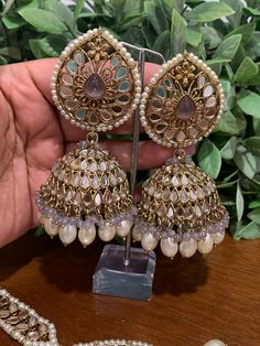 Top class mirror work. Brass base , antique platting , silver mirror and colored bead work. Jhumka is about 5 inch long and Tikka is 3 inch long and 2.75 inch wide. Mirror Jhumka Earrings, Metal Meenakari Jhumkas For Party, Bohemian Kundan Jhumkas For Festive Season, Festive Bohemian Kundan Jhumkas, Party Meenakari Jhumkas In Metal, Party Meenakari Metal Jhumkas, Party Meenakari Jhumkas, Multicolor Metal Chandbali Jhumkas, Silver Kundan Danglers With Cutdana