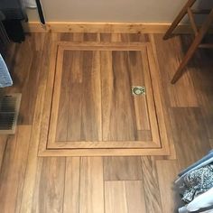 a wooden floor that has been installed in a bathroom