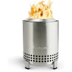 a stainless steel fire pit with flames coming out of the top and bottom, on an isolated white background