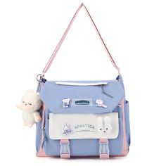 PRICES MAY VARY. 【HIGH QUALITY MATERIAL】 The kawaii shoulder bag is made of high-quality nylon fabric, which is wear-resistant and good in texture, durable to use. 【LARGE CAPACITY】 Size:12.6x11x4.3in. The storage space of this kawaii messenger bag is big enough for your daily belongings. You can easily take your iPad, cell phone, book, wallet, makeup, etc. with you. 【KAWAII ACCESSORIES】Comes with kawaii pins and stuffed pendant. You can also DIY the cute crossbody bag with other kawaii accessori Cheap Light Blue Satchel For Travel, Affordable Light Blue Travel Satchel, Cheap Light Blue Bags With Multiple Compartments, Aesthetic Messenger Bag, Kawaii Pins, Cute Messenger Bags, Messenger Bags For School, Cute Crossbody Bags, Book Wallet