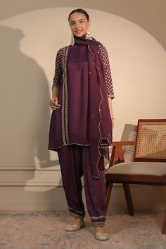 Purple short kurta with dori, cutdana and sequins embroidery in floral butta pattern. Paired with an embroidered hem pant and scallop hem dupatta. - Aza Fashions Cotton Silk Kurta With Mirror Work For Reception, Eid Cotton Silk Blouse Piece With Mirror Work, Cotton Silk Unstitched Suit With Mirror Work For Navratri, Fitted Cotton Silk Palazzo Set With Dabka Work, Fitted Cotton Silk Salwar Kameez With Mirror Work, Cotton Silk Sets With Mirror Work For Reception, Purple Kurta With Mirror Work In Traditional Drape, Fitted Chanderi Kurta With Mirror Work, Purple Georgette Kurta With Mirror Work