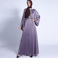 Laila Abaya is must have abaya in your wardrobe. This abaya is made from high quality satin and flow's elegantly when worn. It comes with an embellished belt which increases its elegance and would be perfect for sisters hangout😁 Elegant Satin Maxi Abaya, Satin Floor-length Abaya For Eid, Evening Satin Maxi-length Abaya, Evening Satin Maxi Abaya, Long Satin Kaftan For Eid, Satin Evening Abaya For Eid, Satin Abaya For Wedding And Eid, Eid Evening Satin Abaya, Floor-length Satin Kaftan For Eid