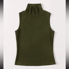 Brand New/Never Worn, Flattering Fit, Gorgeous Forest Green Hue. The Fabric Contains Spandex So It Has That Smooth/Thicker Sort Of Luxurious Feel To It :) Green Stretch High Neck Top, Casual Sleeveless Mock Neck Top, Sleeveless Solid Mock Neck Top For Fall, Casual Sleeveless Mock Neck Top For Fall, Solid Sleeveless Stretch Mock Neck Top, Green Tank Top For Fall, Fall Green Tank Top, Fitted High Neck Vest Top, Chic Stretch Tops From Urban Outfitters