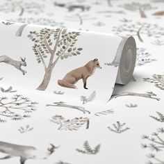 a roll of toilet paper with an image of a fox and deer in the woods