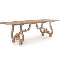 an old wooden table with ornate carvings on the legs and base, against a white background