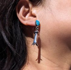 These are gorgeous Native American Women's dangle/stud post Earrings.  Elegant and beautiful Southwestern collectible jewelry. Thes pieces were handmade by different artists  and purchased directly at the Southwest, US.  Measurements and Descriptions: A1- Multi Stones Inlay Dangle Earring with silver plated Ear wire posts. Unsigned.         Drop Length: 2 in         Weight: 1 gram A2- Block Oval Turquoise with fan shaped Bezel setting. Sterling Silver Stud posts.         Length:  1 inch        Weight: 3 grams A3- Saucer and cone shape dangle earrings. Sterling Silver ear wire posts.         Drop Length: 2.5 in        Weight: 6 grams A4- Turquoise stone with squash blossom petal dangle earrings. Non-Pierce screw Closure.         Drop Length: 2 in        Weight:  9 grams Native American Vintage, Stone Inlay, Earrings Elegant, Southwest Style, Multi Stone, Sterling Silver Studs, Style Jewelry, Jewelry Handmade, Ear Wire