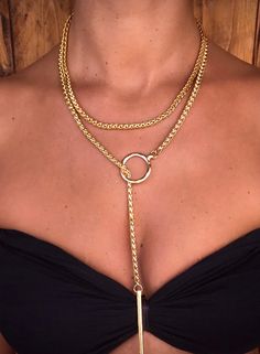 "Trendy Long Doubble Wrap chain. Goldfielld Necklace with Charm and Element Pendant, Statement Women Jewelry A fashionable necklace that will definitely become your favorite one. This necklace features double-wrap braided chain.  In its edges, it has several 14k goldfilled element pendants that add charm to it.    Wear it long as a \"Y\" necklace or wrap it around the neck as a layered necklace. You can Style it with an evening dress, t-shirt, and jeans, or a boho top tank. Either way, you're sure to dazzle for those who value trendy vision! Add this fabulous necklace to your jewelry collection or give it as a gift to a dear woman in your life.  ~ << ✦ ✥ ✥ ✥ ✦ >> ~  ▲ Material: 14 k goldfilled   ▲ Measurement: Necklace length - 95 cm  ▲ Care instructions: I use the best and high-quality ma Metal Lariat Layered Necklace With Adjustable Chain, Bohemian Lariat Necklace With Clavicle Chain For Parties, Metal Lariat Jewelry For Layering, Trendy Lariat Chain Necklace For Layering, Elegant Gold Lariat Choker, Trendy Layering Lariat Chain Necklace, Gold-tone Lariat Necklace For Layering, Lariat Choker With Clavicle Chain, Lariat Clavicle Chain Choker