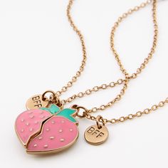 Show off how sweet your friendship is with this strawberry necklace set. The split pendants are adorned with a dainty BFF charm. Finish: Gold-tone Length: 16" + 3" extender Closure: Lobster clasp Pack Size: 2 Material: Metal - Claire's Best Friends Split Strawberry Pendant Necklaces - 2 Pack Cute Adjustable Charm Necklace For Friendship, Adjustable Cute Charm Necklaces For Friendship, Cute Adjustable Charm Necklaces For Friendship, Adjustable Heart Charm Necklace For Friendship, Best Friend Gift Pendant Charm Necklace, Adjustable Charm Necklace For Best Friend On Valentine's Day, Adjustable Pendant Charm Necklace For Best Friend, Valentine's Day Friendship Charm Necklace, Pink Charm Necklaces For Friendship On Valentine's Day