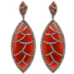 These Bora Bora earrings are cast in 18K gold and sterling silver. It is hand set in 60.25 carat red onyx and 4.45 carat of sparkling diamonds. Complimentary conversion to clip-on earrings is available. FOLLOW MEGHNA JEWELS storefront to view the latest collection & exclusive pieces. Meghna Jewels is proudly rated as a Top Seller on 1stDibs with 5 star customer reviews. All items manufactured by us are handmade and can be customized or redesigned. Composition 18KT Gold 0.980 925 Silver 14.840 Ch Red Carpet Jewelry, Jeweled Earrings, Semi Precious Gems, Onyx Jewelry, Red Jewelry, Onyx Earrings, Unique Jewelry Designs, Red Earrings, Bora Bora