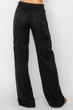 Ready to elevate your wardrobe with a touch of effortless chic? Meet the Sophisticated Tencel Risen Cargo Pants—your new go-to for stylish comfort and versatility. These pants are perfect for any occasion, from a casual day out to a chic evening event. Luxurious Tencel Fabric: Let’s talk about the fabric first. Made from high-quality Tencel, these pants offer a heavenly soft feel against your skin. They’re breathable, drapey, and oh-so-comfortable, making them perfect for year-round wear. Imagine wearing something that feels as good as it looks—that’s what these pants deliver! High Rise Comfort: The high rise design not only adds a touch of sophistication but also ensures a flattering fit. It cinches at the waist and smooths out the silhouette, giving you that effortless elegance we all lo Trendy Fall Cargo Pants For Elevated Casual Wear, Spring Workwear Full-length Cargo Jeans, Full-length Cargo Jeans For Spring Workwear, Full Length Cargo Jeans For Workwear In Spring, High Rise Relaxed Fit Cargo Pants For Fall, High Rise Pants With Side Pockets For Fall, Chic High-rise Cargo Pants For Work, Chic High Rise Cargo Pants For Work, Chic Relaxed Fit Wide Leg Cargo Pants