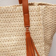 Elena Handbags Straw Woven Tote With Tassle Beige Braided Straw Bag For Shopping, Beige Braided Straw Shopping Bag, Beige Braided Shopping Bag, Beige Braided Bag For Shopping, Rectangular Braided Bags For Shopping, Rectangular Braided Bag For Shopping, Rectangular Braided Shopping Bags, Braided Rectangular Shopping Bag, Natural Braided Bag For Shopping