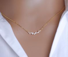 Gift for her!  Crystal Diamond Necklace. Gorgeous dainty crystal every day minimalist necklace. Excellent option for minimalist bride or bridesmaid jewelry! Necklace is about 16" long with an attached extension chain to make it up to 18.5" long. High quality guaranteed by GlamourBrideUSA! SHIPPING: Standard Shipping: 4-6 business days Priority mail Shipping: 2-3 business days *INTERNATIONAL ORDERS: PLEASE NOTE CUSTOMERS ARE RESPONSIBLE FOR ALL DUTIES & TAXES* Bridesmaids Necklaces, Diamond Necklace Bridal, Gold Bridesmaid Necklace, Minimalist Necklaces, Minimalist Bride, Dainty Diamond Necklace, Necklace Bridal, Necklace Minimalist, Bridesmaid Necklace