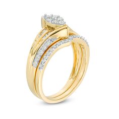 Tell her you how much she means to you with this luxurious diamond bridal set. Crafted in warm 10K gold, this sumptuous choice showcases a marquise-shaped composite of shimmering diamonds. Sculpted bypassing ribbons highlight the center and the multi-row round and baguette-cut diamond-touched shank. The perfect complement, the diamond-lined contoured wedding band completes her ensemble. Radiant with 1/2 ct. t.w. of diamonds, this bridal set is polished to a bright shine. Marquise Cut Bridal Sets With Diamond Accents, Contoured Wedding Band, Contour Wedding Band, Bridal Engagement Rings, Diamond Bridal Sets, Baguette Cut Diamond, Bridal Set, Tell Her, Bridal Sets