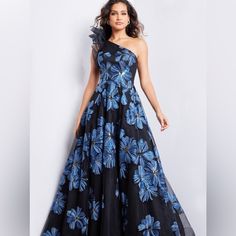 Bought This Pre-Owned Dress From The Real Real. Unfortunately, It Didn’t Quite Fit Me. Its Is Gorgeous. It’s Approximately 59” Long. Laying Flat The Waist Is About 14” Across. I’m 5’7” And Still Would Need To Wear Heels To Accommodate The Length Of The Dress. The Gown Is On The Jovani Website And Retails For $1500. It Is Black Chiffon Sheer With Embroidered And Sequin Blue Flowers. One Shoulder And Zips Up The Back. It Has A Substantial Crinoline Underneath To Keep The Gown’s Shape. There Is Som The Real Real, Real Real, Jovani Dresses, Black Chiffon, Dress First, Blue Flowers, To My Daughter, Black Blue, Blue Black