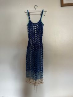 Handmade jumpsuit. 100% cotton yarn.  It is very comfortable and perfect for summer days. It fits size S-M Summer Cotton Jumpsuits And Rompers For Vacation, Blue Crochet Maxi Dress For Beach, Blue Crochet Maxi Dress For The Beach, Blue Maxi Crochet Dress For The Beach, Blue Maxi Crochet Dress For Beach, Cotton Beachwear Jumpsuits And Rompers For Summer, Summer Beachwear Cotton Jumpsuits And Rompers, Blue Crochet Maxi Dress For Summer, Summer Cotton Jumpsuits And Rompers