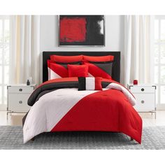 red and white bedding with black accents in a modern style bedroom, on carpeted area