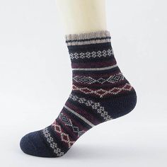 Our unisex, Wool Nordic Socks have a wonderful, vintage inspired look. Made of warm wool, these socks are guaranteed to keep your feet cozy and comfortable, even on the coldest, winter nights! Soft, snug, and breathable, the Wool Nordic Socks are made using a moisture-wicking, odor-resistant fabric. They're so comfortable to wear, you'll never want to take them off! The trendy design features warm, muted colors that coordinate well with fall and winter fashions. Warm those cold, winter mornings Nordic Socks, Unique Socks, Minimalist Pattern, Tumblr Outfits, Winter Socks, Winter Nights, Wool Socks, Men Model, Fashion Socks