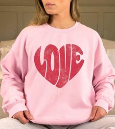 Cute Retro Love Heart Sweatshirt, Womens Valentines Day Sweatshirt, Valentine Sweater, Womens Valentines Day Shirt, Valentines Gift for Her Thank you so much for taking the time to browse my shop. Please feel free to reach out if you have any questions before or after purchasing.  💖 🎨Warning: On products with a print chart in the listing, metallic print colors are printed as matte.✌✨ We design and cut each graphic out with a soft touch, use matte vinyl and a heat press. The result will last fo Valentine Sweater, Valentines Day Sweatshirt, Valentines Gift For Her, Retro Love, Valentines Day Shirt, Heart Sweatshirt, Metallic Prints, Valentines Gifts For Her, Oversized Style