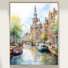 a watercolor painting of boats on a canal with buildings in the background