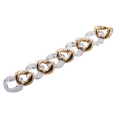 18k gold and crystal large link bracelet by Seaman Schepps. DESIGNER: Seaman Schepps MATERIAL: 18k Gold GEMSTONES: Crystal DIMENSIONS: Bracelet is 8 1/8" long end to end, approx. wearable length is 7-7.5", width 30mm. MARKED/TESTED: 1959, Seaman Schepps, Shell mark, 750. WEIGHT: 113.1 grams. CONDITION: Previously Owned, Excellent Condition. Elegant Clear Jewelry With Chain, Modern Clear Bracelet Jewelry, Formal Gold Lucite Jewelry, Clear Bracelet Jewelry For Formal Occasions, Formal Clear Lucite Jewelry, Elegant Lucite Jewelry For Formal Occasions, Seaman Schepps, End To End, Stunning Jewellery