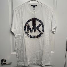 Never Worn . Was A Present I Never Got To Gift . Michael Kors Cotton Crew Neck T-shirt, Michael Kors Cotton Top With Logo Print, Michael Kors Cotton Crew Neck Top, Michael Kors Cotton Top With Graphic Print, Michael Kors Cotton Short Sleeve Tops, Michael Kors Casual Short Sleeve T-shirt, Casual Michael Kors Short Sleeve T-shirt, Casual Michael Kors Short Sleeve Tops, Casual Short Sleeve Michael Kors Tops