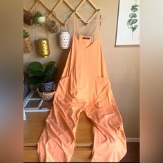 Brand New Casual Orange Jumpsuits And Rompers For Spring, Casual Orange Jumpsuits And Rompers For Day Out, Spring Orange Jumpsuits And Rompers For Loungewear, Orange Jumpsuits And Rompers For Spring Loungewear, Spring Orange Jumpsuit For Loungewear, Orange Jumpsuit For Spring Loungewear, Color Orange, Pant Jumpsuit, Jumpsuit Romper