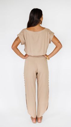 Take a walk on the chic side in the radiant Khush Clothing Haven Pant. Featuring a relaxing smocked-waist for an easy, comfortable fit, charming round bottom hem and side slits finished with covered button detail. These delightful pants will be an easy go-to for relaxed, sophisticated and a little boho. Paired here with the Mareva Top in Latte. ** Our Model is 5'8" and wearing a size SMALL. ** Fabric and Care Instructions: *100% Rayon *Hand wash cold * Line Dry Retail Boutique, Casual Jewelry, Take A Walk, Signature Jewelry, Easy Going, The Chic, Button Detail, Walk On, A Walk